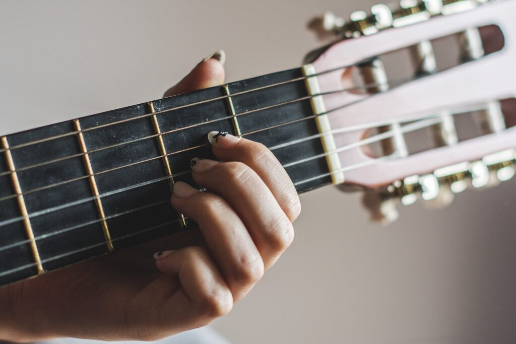 Learn how to tune your guitar by ear or tuner